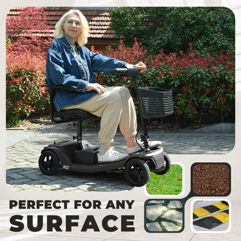 Front view of Metro Mobility four-wheel powered mobility scooter in black with front basket; user seated outdoors.