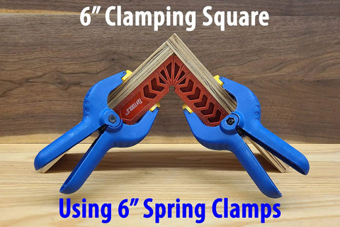 Four Piece 6 Inch By 6 Inch Glass Reinforced Nylon Corner Clamps For 90 Degree Cabinet Jigs And Square Assemblies in use on wood