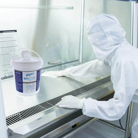 Technician using 96 Percent Isopropyl Alcohol Wipes 4000 Count Bulk Pack For Cleanrooms Labs And Sensitive Equipment inside a cleanroom.