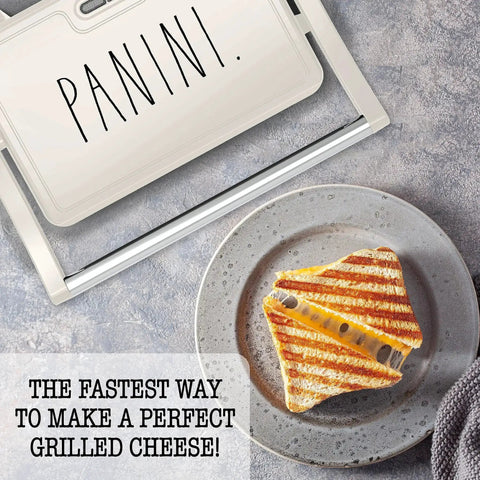 Panini Maker 750W 2 Slice Grill With Indicator Lights, open design showing grilled sandwich, creamy nonstick surface, essential kitchen appliance