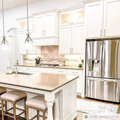 Modern kitchen with white cabinets featuring Milano Door And Drawer Pull 8 Inch Center-To-Center In Oil Rubbed Bronze.