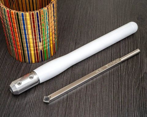 Turning Acrylic and Resin on a Wood Lathe Made Easy With This 3 Tool Carbide Set for Hybrid Projects Featuring 9 Inch Tools and 12 Inch Colorful Handles USA Made Shearing Cut Tools for Clean Consistent Results, showing a stainless steel tool and colorful handle on a dark surface.