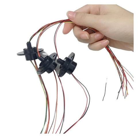 Hand holding Go To Compact 22mm Flange Slip Ring with 2A current rating, conductive ring brush, multiple colored wires visible