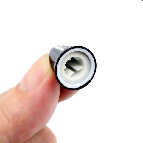 Close-up of a black plastic D-type potentiometer knob for 6mm shafts, part of Set Of 10 D Type Potentiometer Knobs For 6mm Shafts, 16 x 18mm