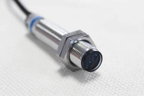 Diffuse Reflection Photoelectric Switch Sensor E3F1DS5C4 NPN NO 18mm Diameter, 5cm Sensing Range Transducer, close-up view.