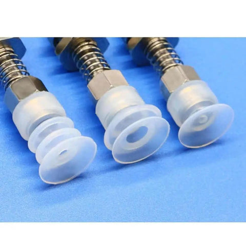 Industrial Pneumatic Vacuum Suction Arm Kit With Metal Tracheal Adapter showing three Beefy 50mm Two-Layer Suction Cups on blue surface