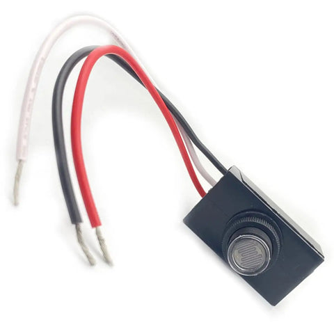 Outdoor 120V AC Dusk To Dawn Photocell Switch with wires for exterior post lights, front view showing light control sensor.
