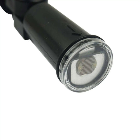 Outdoor Dusk To Dawn Photocell Switch 120V hard wired post eye light control close-up, weatherproof sensor with swivel mount for exterior lighting