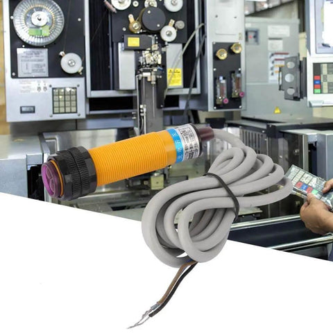 Photoelectric Switch Sensor DC6-36V E3F-DS30C4 NPN NO Proximity Sensor in industrial setting with machine tools