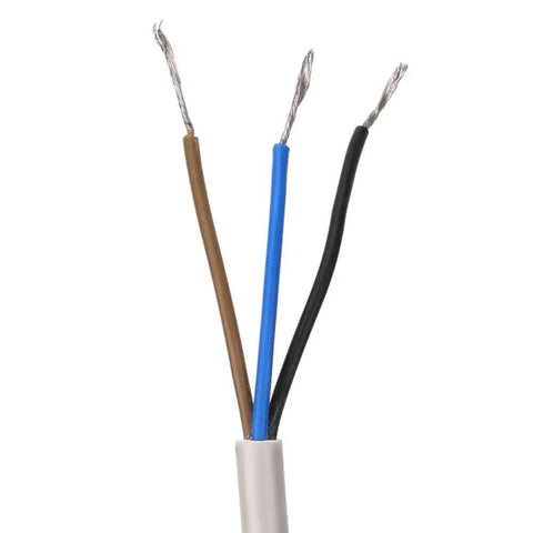 Close-up of three exposed electrical wires in brown, blue, and black