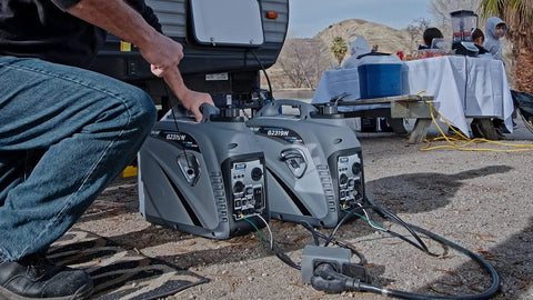 Man operating Quiet 2300W Portable Gas Powered Inverter Generator with USB Outlet at a campsite, showing compact suitcase design.