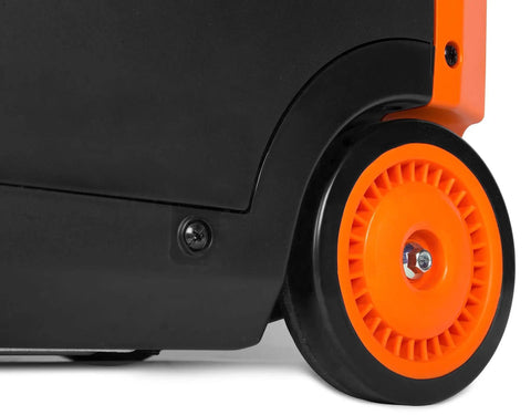 Close-up of Quiet Dual Fuel Inverter Generator with Electric Start, showing orange wheel and black casing for portability