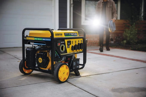 Tri Fuel 12,500-Watt Electric Start Portable Generator With CO Shield in driveway, runs on natural gas, propane, or gasoline