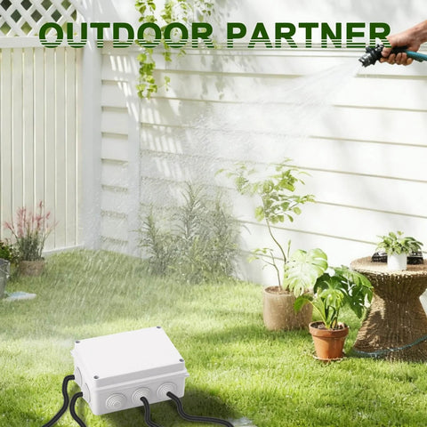 Rugged Reinforced ABS Electrical Junction Box IP65 Weatherproof Outdoor Enclosure in garden setting with hose spray