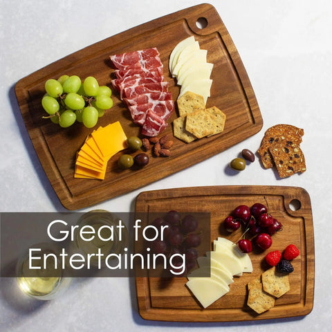 Two Piece Acacia Wood Cutting Board Set For Kitchen Prep, Dual Boards For Meat And Veggies To Prevent Cross Contamination, Durable Wooden Cutting Boards With Knife Friendly Surface TB Home, two boards filled with cheese, fruit, and crackers for entertaining.