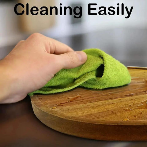 Two Tier Acacia Wood Lazy Susan Organizer For Kitchen Cabinet Or Pantry Turntable being cleaned easily with a green cloth.