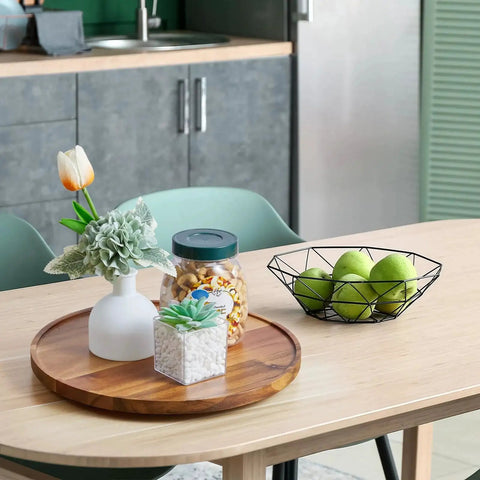 12-Inch Acacia Wood Lazy Susan Turntable Organizer on kitchen table with plants and snacks, space-saving decorative tray for dining room decor