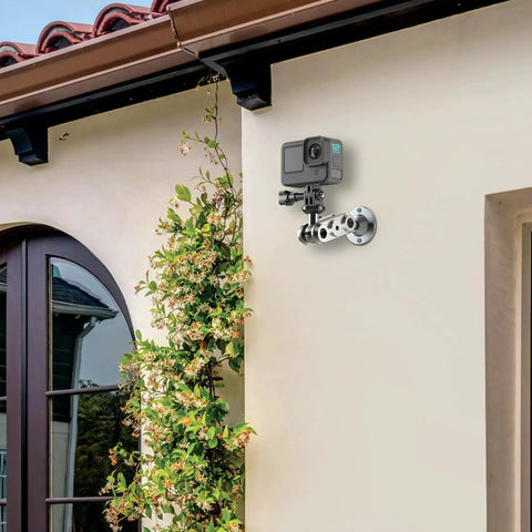 Universal Wall Mount Bracket with Adjustable Metal Arm installed outdoors with action camera, heavy duty dual ball head for stable mounting