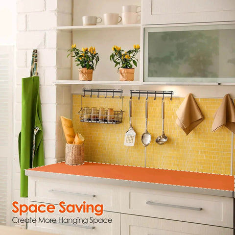 Adhesive Kitchen Hooks Utensil Hanger Holder Hanging Rack 2 Pack with spoons and cups on wall-mounted kitchen rail against yellow tile backsplash