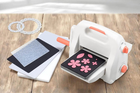 Adjustable Die Cutting And Embossing Machine With Six And One Quarter Inch Feeding Slot For Six Inch Paper And Other Materials Height Adjustment Gear System For Easy Projects By Bira Craft on wooden table with dies
