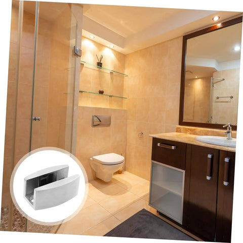 Experience a quiet, draft free doorway with an adjustable stainless steel swing stopper and glass fixing locator in a bathroom setting.