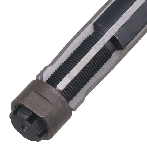 Close-up view of adjustable high speed steel hand operated reamer with slitting diameter 29.5 to 33.5 millimeters, pro grade metalworking tool.