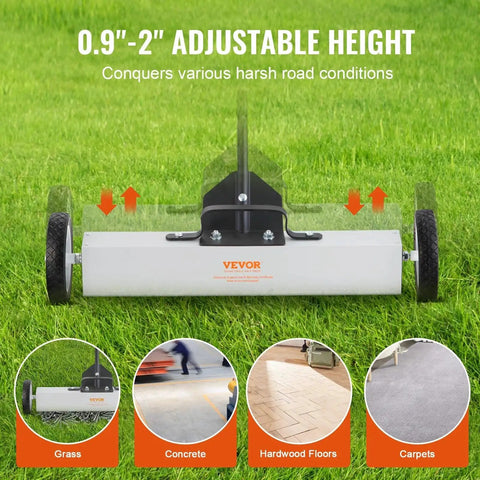 Effortless, heavy duty rolling magnetic sweeper with a 24 inch wide magnet and 50 lb pickup capacity on grass surface