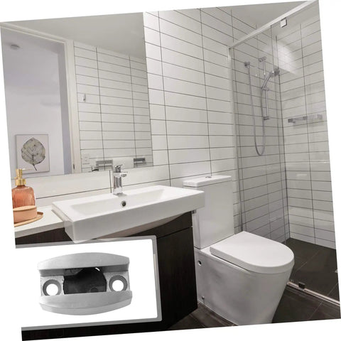 Experience a quiet, draft free doorway with an adjustable stainless steel swing stopper and glass fixing locator in bathroom