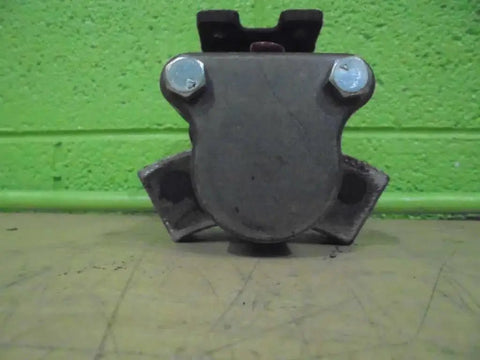 Front view of air actuated disc caliper brake with 1200 inch pound torque, featuring T bracket mount and single unit design against green background.