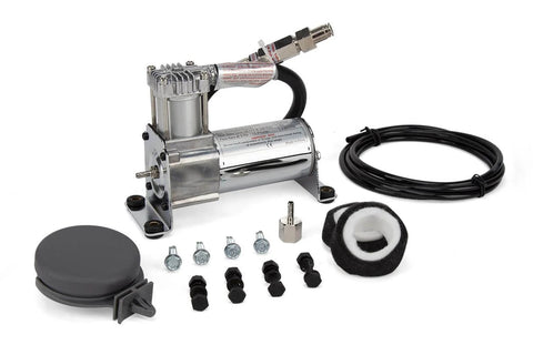 Air Lift 16092 Air Compressor System with accessories, including wiring, screws, and air hose, suitable for suspension kits.