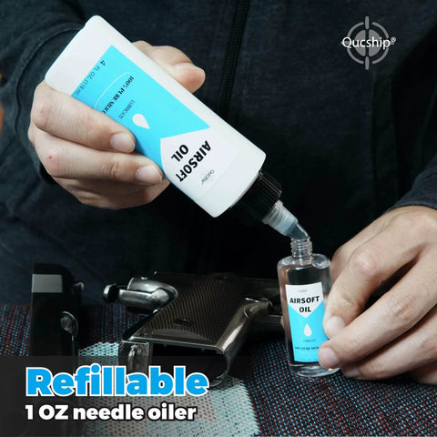 Person using Airsoft Oil 4 oz & 1 oz Needle Oiler 100% Silicone Air Gun Oil to lubricate airsoft gun on table.