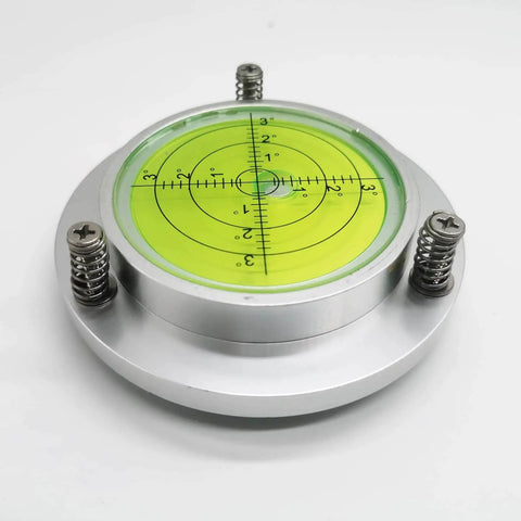 High precision 100mm bubble level gauge showing green circular display with calibration marks, aluminum housing, and mounting holes