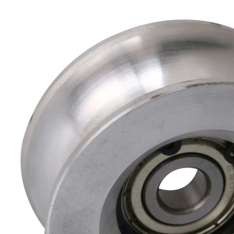 Close-up of a 60mm Diameter 25mm High Passive Round Guide Pulley Wheel made of Aluminum and Bearing Steel with 10mm Groove Radius.