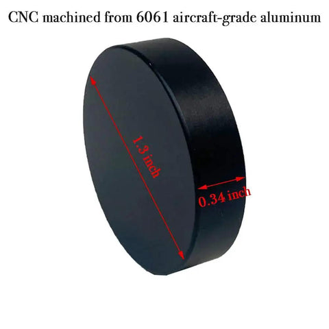 Side view of black 1.3-inch disc, 0.34-inch thick, CNC machined from 6061 aircraft-grade aluminum for high precision use.