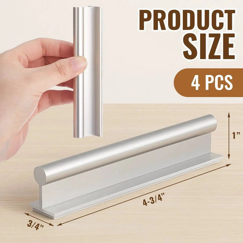 Hand holding one of the Four Pcs SelfAdhesive Edge Finger Pull Door Handles For Cabinets Closets And Sliding Doors Screwless Peel And Stick