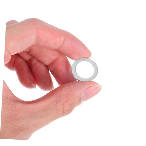 Hand holding an aluminum washer from Temperature Resistant Gasket Washers Set 200 Pcs For Automotive And Industrial Leak Prevention