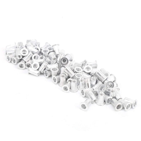 100 Pcs Aluminum Flat Head Vertical Pull Rivet Nuts Set M5 Auto Aviation Industrial Hardware WJ-30045M5 scattered on surface