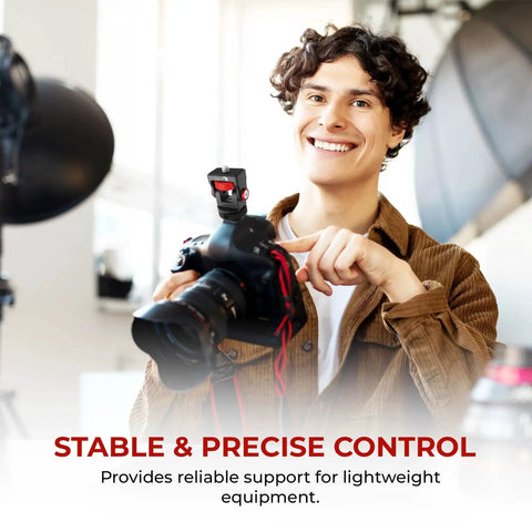 Person using a camera mounted on Aluminum Mini Ball Head With 360 Degree Rotation for Cameras Phones Monitors and LED Lights