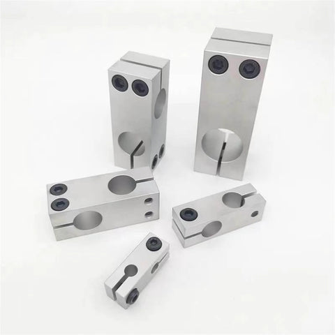 Assorted sizes of Aluminum Optical Shaft Cross Clamp For Parallel And Vertical Connections 16mm Double Hole Connector displayed