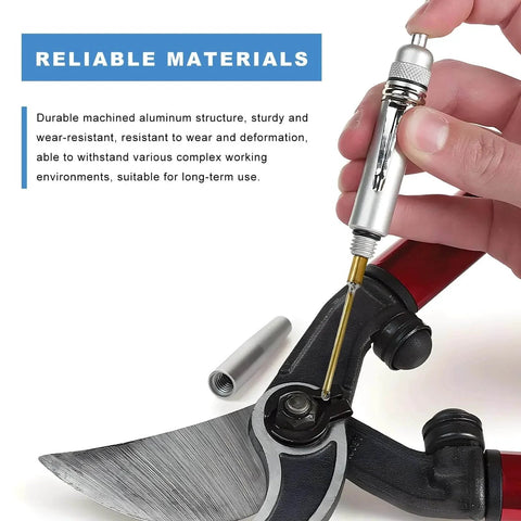 Aluminum Precision Oiler Pen With Solid Needle And Pocket Clip lubricating garden shears, showing close-up use on mechanical equipment.