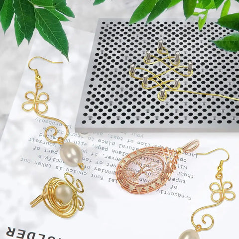 Aluminum Wire Bending Jig For Jewelry Making And Wire Wrapping 677 Hole Reusable Tool with displayed wire jewelry designs.