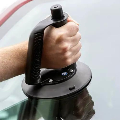 Two Piece Beefy Angle Grip 6 Inch Vacuum Suction Cup for Auto Glass Handling in use lifting car glass with secure grip.