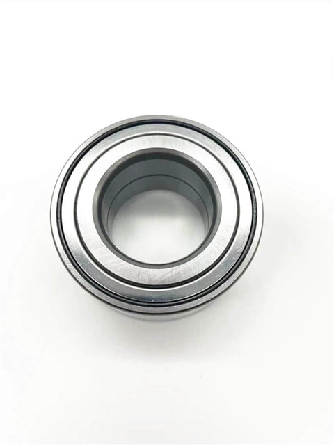 High-performance drop-in front wheel radial thrust angular-contact ball bearing with housing, OE A2469810006, viewed from top.