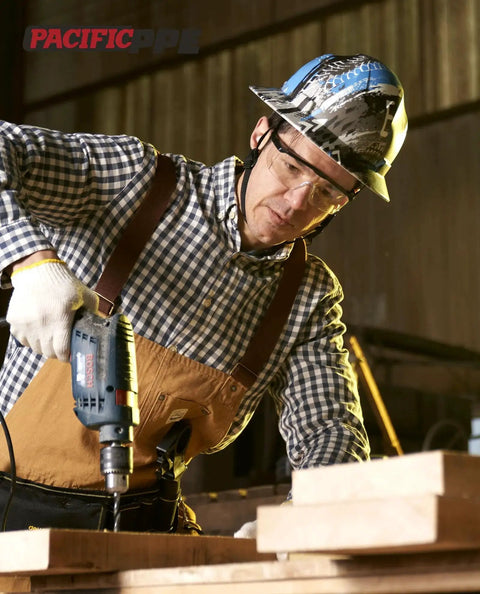Worker wearing 2 Pack Anti Fog Safety Glasses For Men And Women With ANSI Z87 UV Protection while using a power drill