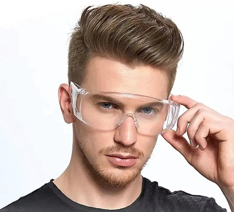 Man wearing Anti Fog Safety Glasses Wide Eye Shield ANSI Z87.1 EN 166 UV Protected 2 Pack, showing clear lenses and wraparound fit.