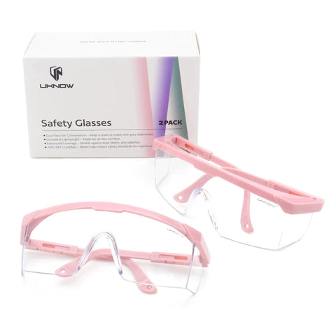 Anti Fog Safety Goggles 2 Pack With Adjustable Temples And Clear Lens ANSI Z87.1 in pink, with box in background