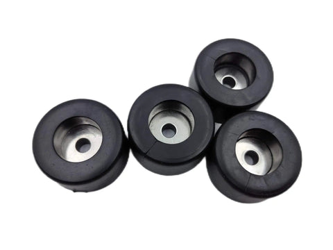 4 black rubber disc anti vibration foot pads with metal inserts, suitable for compressors, generators, and sound machines.