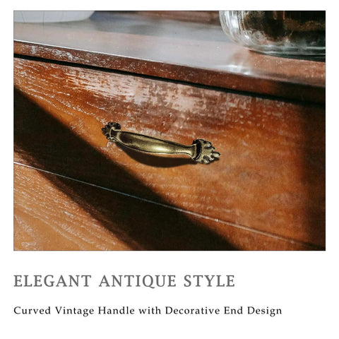 4 Pack Antique Brass Cabinet Handles With Vintage Decorative Drawer Pulls on wooden dresser, close-up view