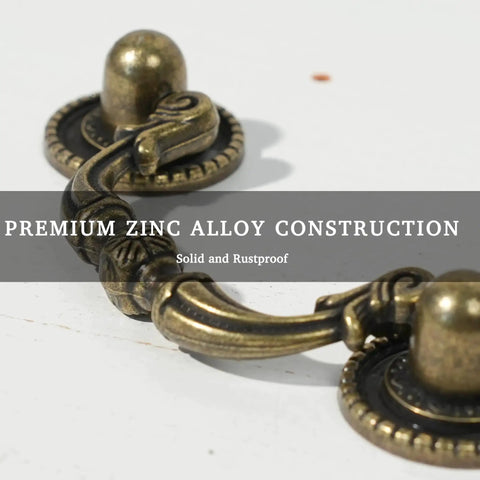 Close-up of 6 Pack Antique Brass Drawer Pulls With 2-1/2 Inch Hole Centers (64mm) showcasing premium zinc alloy construction