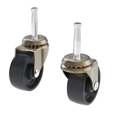 Two antique brass plated steel casters with plastic wheels, stem casters with ball bearings, 2-inch diameter, for furniture mobility.